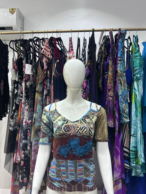 The Azure Mosaic Vintage Top – blue mixed print top with short sleeves