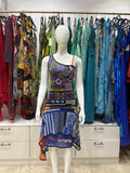 Blue Save The Queen Dress - A sleeveless, asymmetrical Save The Queen dress featuring a colorful, busy patchwork print with blue, purple, orange, and black patterns.
